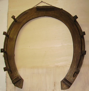 Picture of wall clothes hanger horseshoe-shaped 
