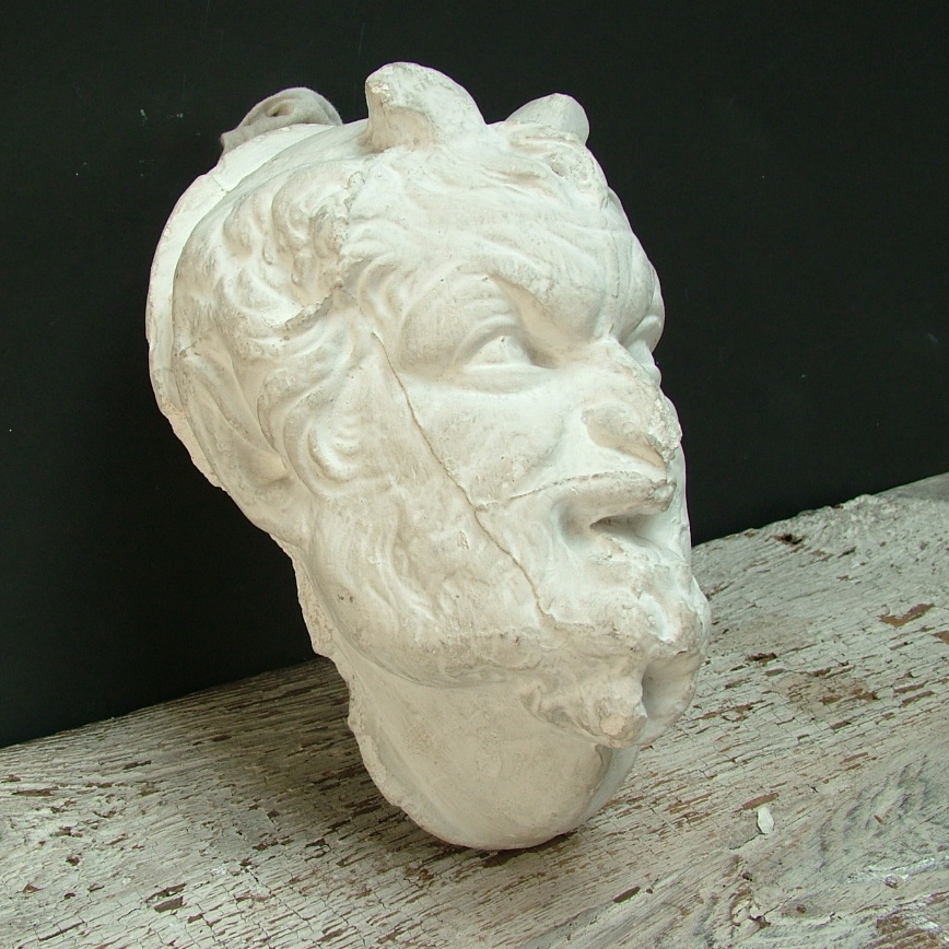 Picture of Plaster cast high-relif of an head of a faun