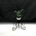 Picture of small wrought iron planter from 50s
