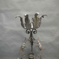 Picture of wrought iron planter with leaves