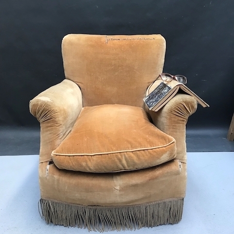 Picture of Small armchair covered in light brown velvet