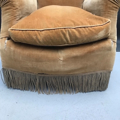 Picture of Small armchair covered in light brown velvet