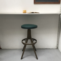 Picture of Stool with green faux leather seat and painted in gold wood legs