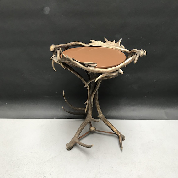 Picture of round tea table with deer and fellow deer antler
