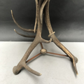 Picture of round tea table with deer and fellow deer antler