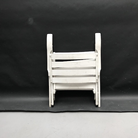 Picture of White folding chair with armrests