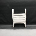 Picture of White folding chair with armrests