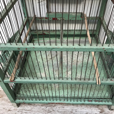 Picture of light green wooden birdcage