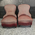 Picture of Pair of red armchairs